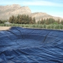 Dam liner installation - Power Plastics