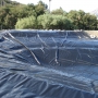 Dam liner installation - Power Plastics